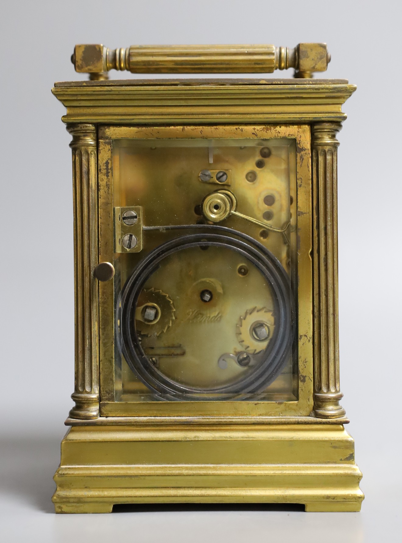 A French quarter repeating gilt brass carriage clock, 14 cms high